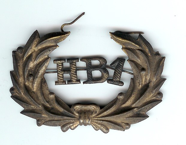 An antique Honey Brook parade hat insignia